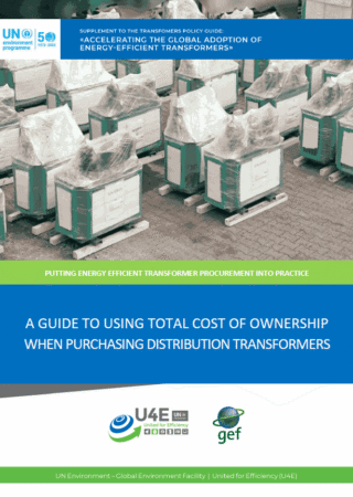 Several large electrical transformers are lined up on pallets in a warehouse. The cover text promotes a guide to using total cost of ownership when purchasing distribution transformers, supported by environmental organizations.