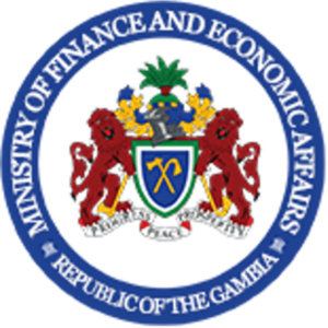 Seal of the Ministry of Finance and Economic Affairs of The Gambia, featuring two red lions, a shield with crossed tools, and a blue ring with the ministry and country name.
